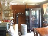 Antique china cabinet and some of the tackle boxes