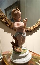 Cupid porcelain figurine