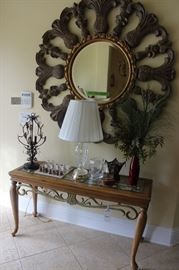 The mirror inthis picture is not for sale, only the table and items on it are for sale