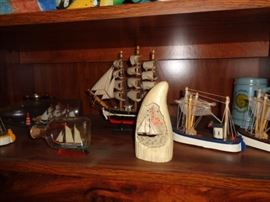 Smaller model ships and boats and ships in bottles