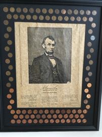 This is a cool piece -- there are about 100 pennies featured, including a 1909 -- is it a DVB?