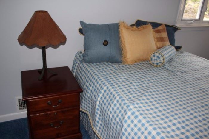 Bed and Nightstand with Lamp