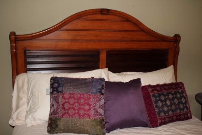 Wood Headboard and Decorative Pillows