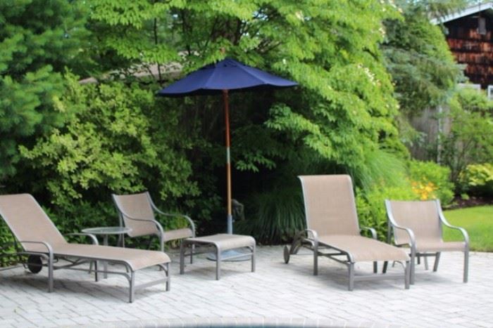 Outdoor Lounge Chairs, Ottoman, Small Side TAble and Blue Umbrella