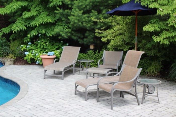 Patio Lounge Chairs, Small Side Tables and Blue Patio Umbrella
