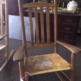 several old cow hide chairs