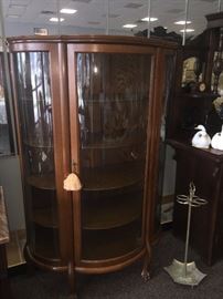 beautiful antique curved glass china cabinet