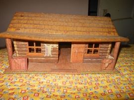 Child's metal cabin toy