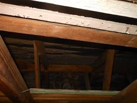 Old well pulley and oil lantern