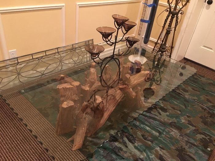 Beautiful glass top coffee table with driftwood base