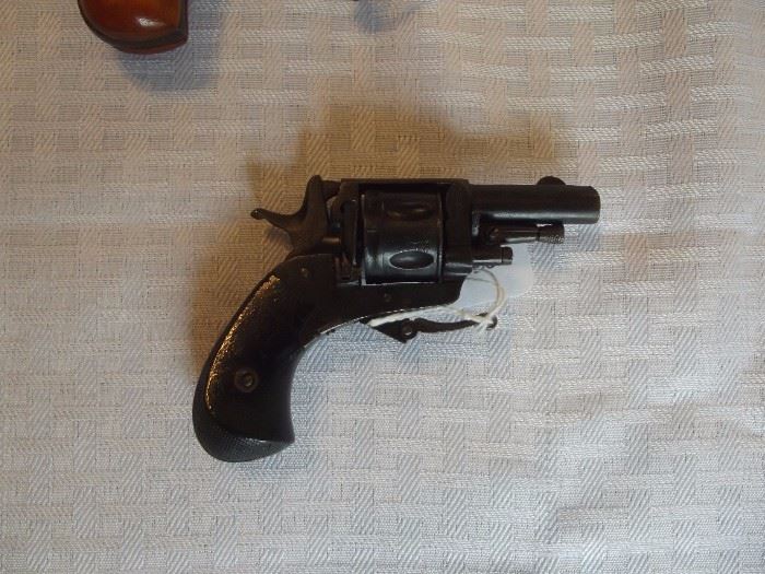 Smaller Bulldog pocket gun, .22-.25 caliber. 
