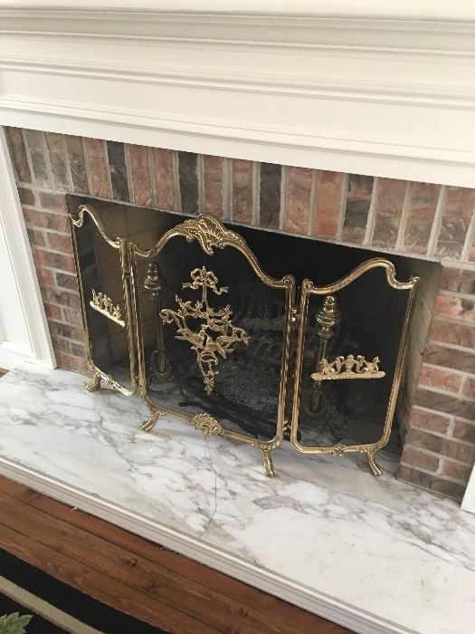 Ornate vintage fireplace screen