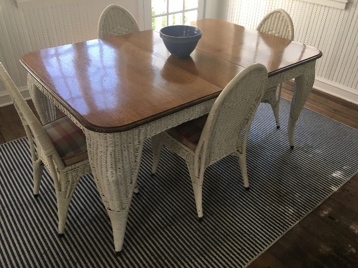 Heavy antique wicker dining table and chairs