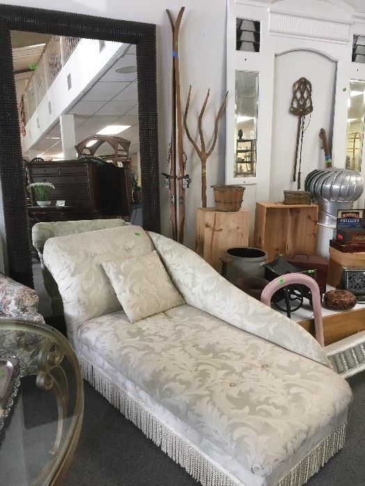 Fainting sofa and large mirror