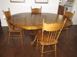 Nice Oak Dining Table with Four Pressed back chairs