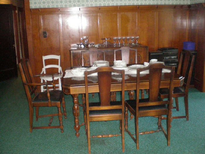 Beautiful Dining Room Table with six chairs and three leaves, matches buffet and china cabinet. 