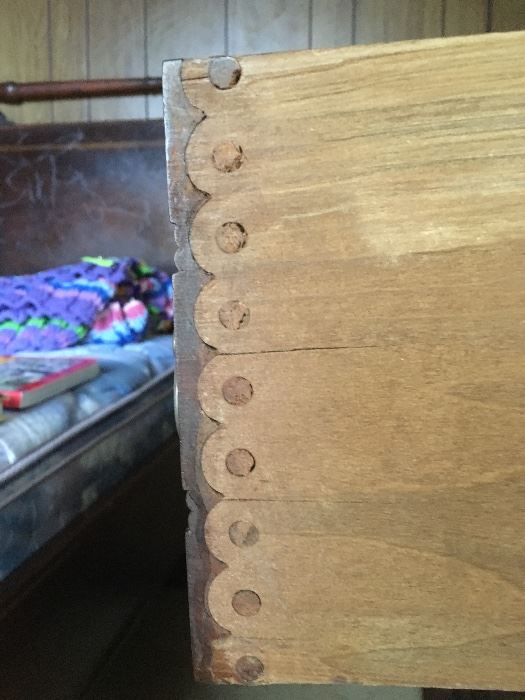 Wood peg dovetails on marble top chest