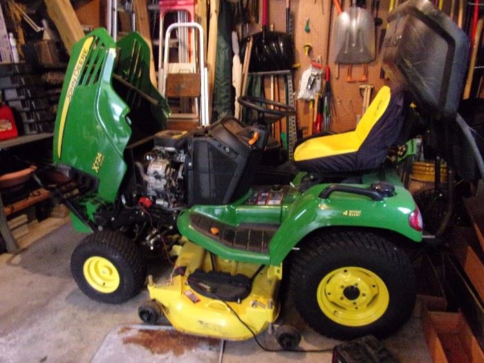 2005 John Deere X724 LOW HOURS Wide deck, Bagger, 48 inch mowing deck and much more. Details to be updated. This was purchased and maintainence provided through Reynolds Lawn & Leisure in Shawnee, KS $6000.00 cashiers check (New cost $17,000)
