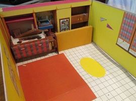 Inside Barbie's house.  The furniture is there against the wall. Great condition.