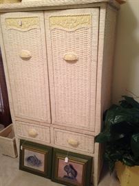 The wicker armoire matches the bed, vanity dresser and nightstand.