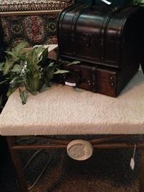 One of two matching side tables; decorative boxes