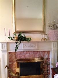 Large gold mantel mirror; brass giraffees and candleholder
