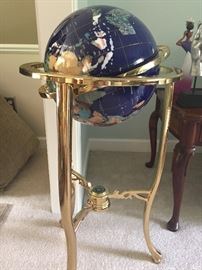 globe in brass stand