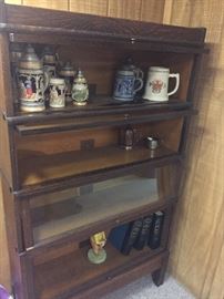 Lawyers bookcase with glass front and beer stiens