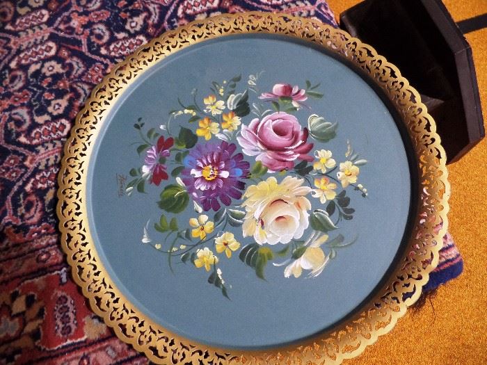 Several hand painted trays