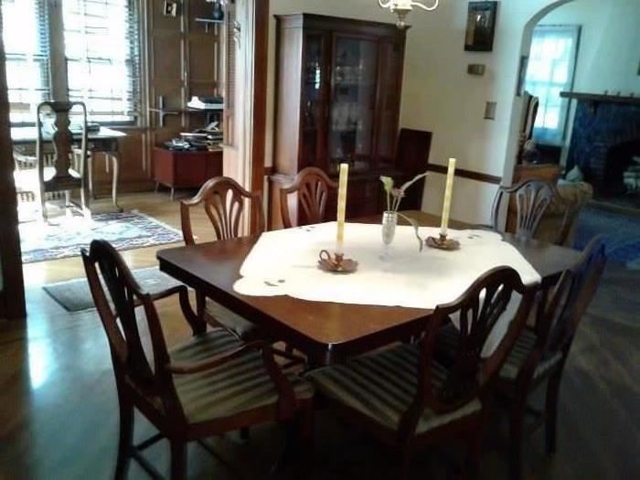 Antique table with 6 chairs.