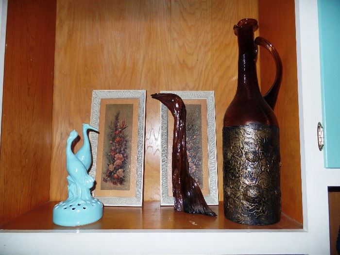 Large brown glass bottle and turquoise birds
