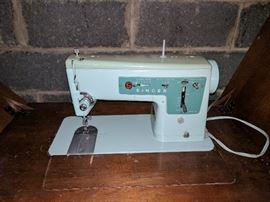 Singer sewing machine with cabinet