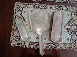 Sterling mirror and brush set