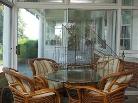 Glass and Rattan casual dining set with 4 chairs