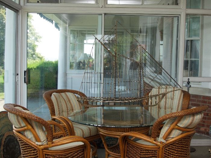 Glass and Rattan casual dining set with 4 chairs