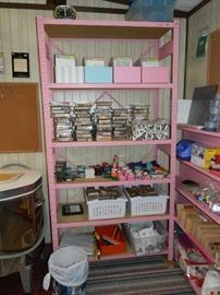 More shelves filled with both sewing items & card stock - Stampin it stamps, punches and more...