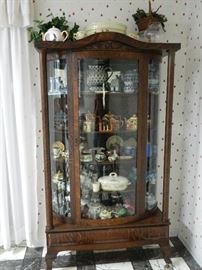 Love old curio cabinet