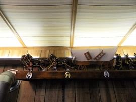 Florida room has a railing all around the room and it's full of these handmade stagecoaches with horses. Absolutely amazing craftsmanship 