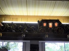 Several stagecoaches are lighted