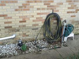 Hose and watering cans