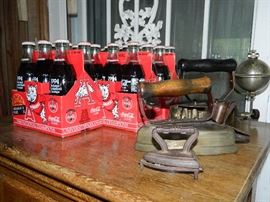 Vintage coke collectible bottles & sad irons