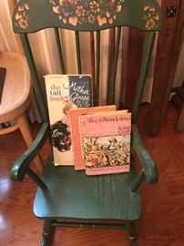 Child's rocking chair and books
