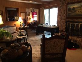 A look into the den.  On the floor is a very pretty rug