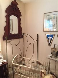 The East Lake Mirror and a close look at the bed and baby cradle.