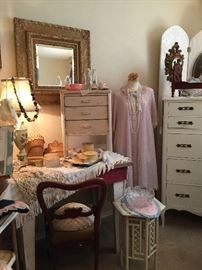 Farm house table, Victorian small painted table, chair, a great collection of French Ivory and satin glass pieces, toile lamp, small painted 3 drawer side table, dress form, wonderful gold framed beveled mirror
