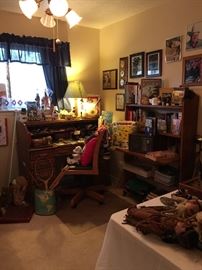 This is the Boys Room!!  Lots of signed sports memorabilia, Lots of Texas Rangers items including clothing, games, roll top desk, bookcase desk, office chair and toys