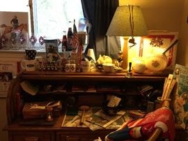The roll top desk has lots of Nolan Ryan items, lots of vintage office items and other baseball