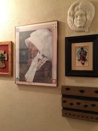 The hallway art and ceramic piece, the wood block with the holes is an antique fabric stamp