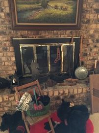 A close look at the fireplace with lots of vintage metal