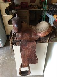 Hand carved leather saddle